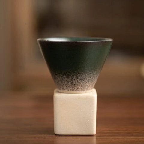 Kyoto espresso cup with gradient green-to-black glaze on clay body
