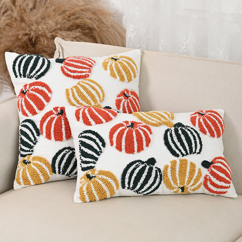 Halloween pumpkin tufted throw pillow cushion cover in festive fall colors on sofa