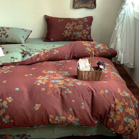Rustic autumn leaf cotton duvet cover set in rust and sage green with matching pillowcases