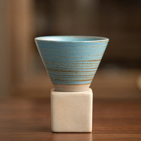 Handmade Kyoto ceramic espresso cup in soft blue with hand-striped detailing