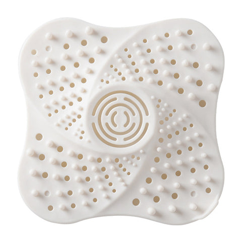 White drain catcher with suction holes and swirl grip