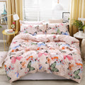 Butterfly bedding set with pink tones in sunlit bedroom