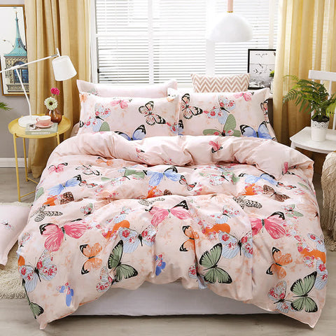  Butterfly bedding set with pink tones in sunlit bedroom