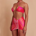 Pink low-rise bikini set with matching mesh skirt – straight standing pose