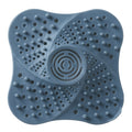 Blue silicone drain hair catcher with swirl grip