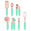 Set of kitchen utensils with rose gold and mint green handles on a white background