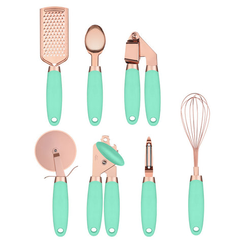 Set of kitchen utensils with rose gold and mint green handles on a white background