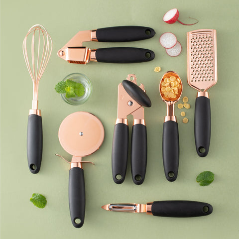 Complete modern utensil set including whisk, grater, garlic press, pizza cutter, peeler, and more. Perfect for everyday cooking and baking.