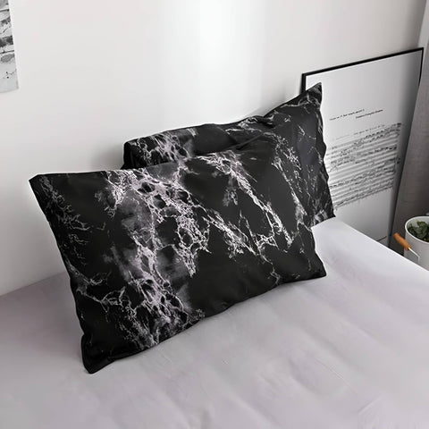 Black marble pillowcases from duvet bedding set on full bed