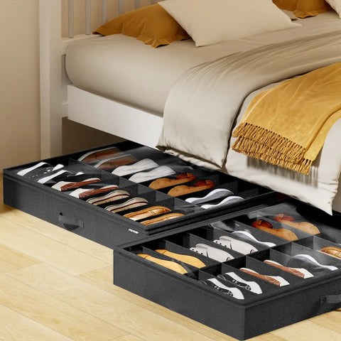 Black shoe organizer with shoes underneath a bed in a bedroom setting.