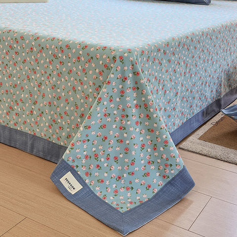Create your cozy floral retreat, where tiny blooms inspire peaceful nights
This cotton coverlet displays sweet ditsy florals in calming blue and coral tones with dark trim accents. The soft cotton fabric serves perfectly as a summer blanket, layering quilt, or standalone bedspread, while the miniature flower design brings gentle femininity to any bedroom decor.