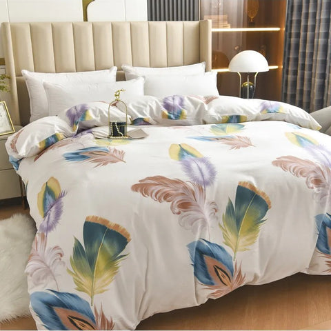 Featherbloom bedding set displayed on full-size bed with nightstands