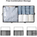 Gray storage bag with compartments containing clothes on a white background