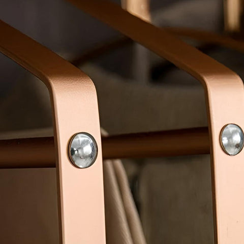 Golden finish clothes organizer on wardrobe rail