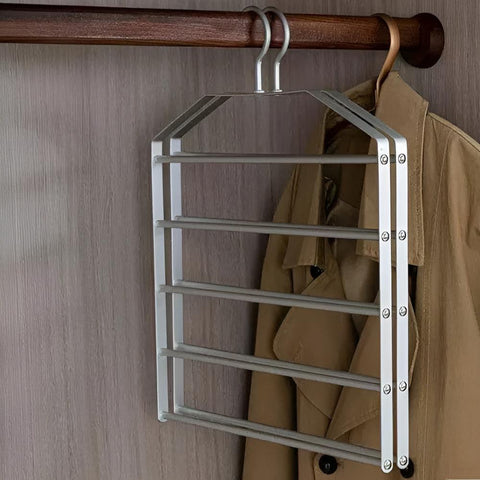 Metal hanging rack on a wooden rod with a beige coat in the background