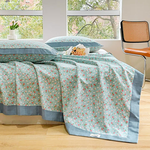 Embrace cottage-core comfort, where delicate florals meet modern convenience
This pure cotton quilt showcases precious ditsy flowers in tranquil blue and coral hues with sophisticated trim finishing. The lightweight design functions as an airy summer bedspread or cozy layering coverlet, while the petite floral print adds vintage charm with contemporary appeal.
