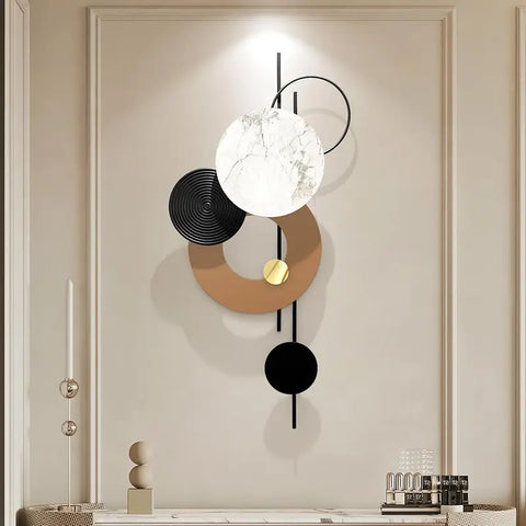 Modern wall light fixture with geometric design on a neutral wall.