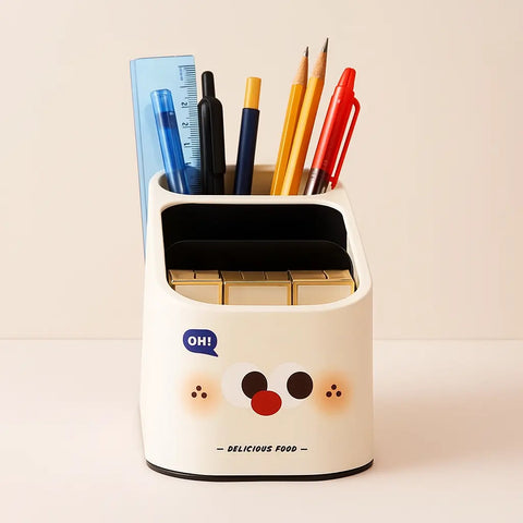 Pencil holder with stationery items on a beige background