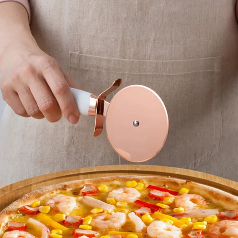 Strong stainless steel pizza cutter included in 7-piece kitchen set. Perfect for slicing pizzas, quesadillas, and flatbreads.
