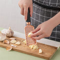 High-quality handheld grater for cheese, carrots, chocolate, and more. Part of the 7-piece kitchen utensil collection.