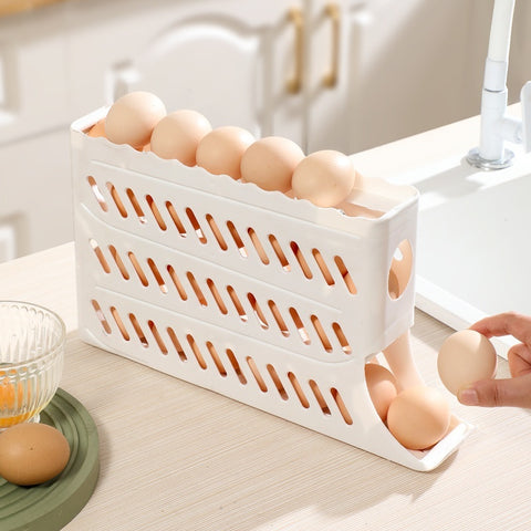 White egg holder with eggs on a kitchen counter