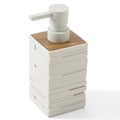 White soap dispenser with wooden top on a white background