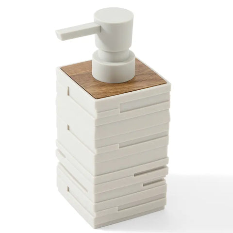 White soap dispenser with wooden top on a white background