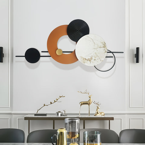 Modern wall art with circular shapes in a dining room setting