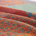 Detailed edge stitching and colorful pattern on cotton quilt