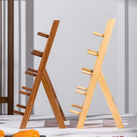 Rear angled view of two knife holders in pine and sapele