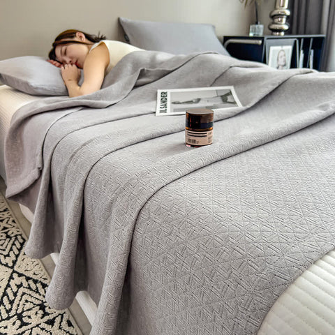 Gray cotton quilt with breathable triple-layer gauze design