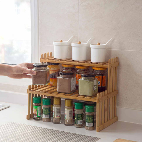Wide view of bamboo rack styled on a white desk