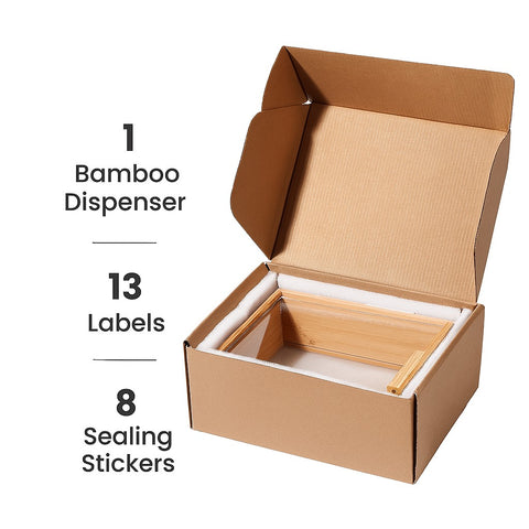 Open cardboard box containing a bamboo dispenser with text indicating contents.