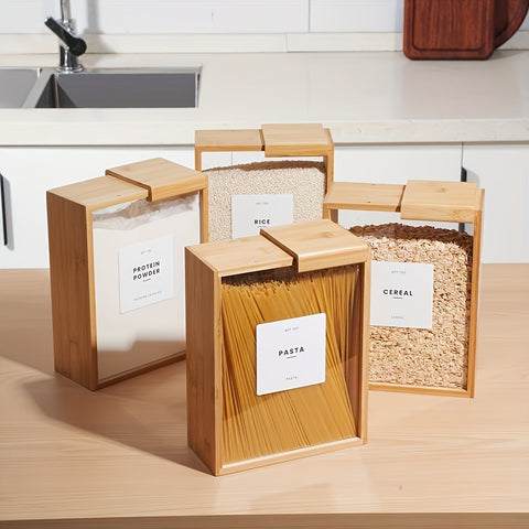 Wooden storage containers labeled 'Protein Powder', 'Cereal', and 'Pasta' on a kitchen counter.