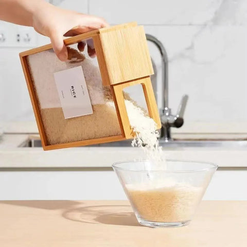 Pouring rice from bamboo grain container into glass bowl
