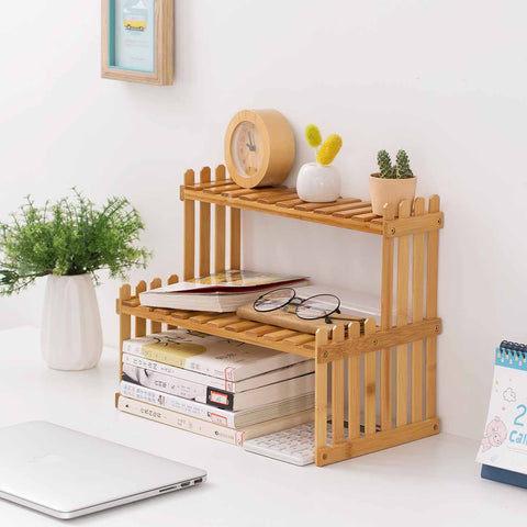 Compact bamboo kitchen rack holding seasoning jars and white canisters near window