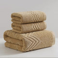 Beige hotel-style towel set with premium cotton texture