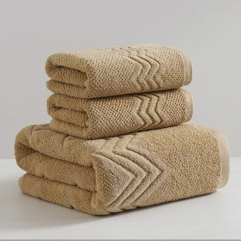 Beige hotel-style towel set with premium cotton texture