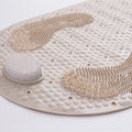 Beige textured shower mat with pumice stone