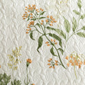 Soft cotton quilt with botanical floral print and quilted detail