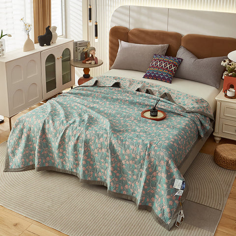 Lightweight breathable quilt styled in cozy bedroom setting