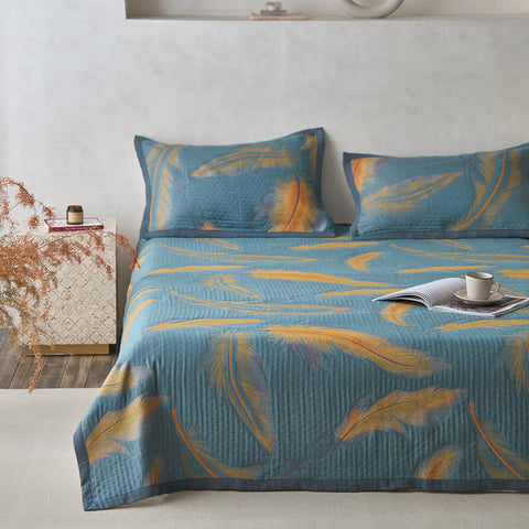 Full bed display with matching feather cotton quilt and pillowcases