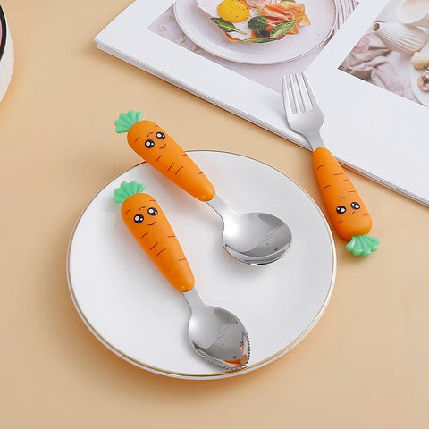 Fun carrot-style spoon and fork for toddlers on plate
