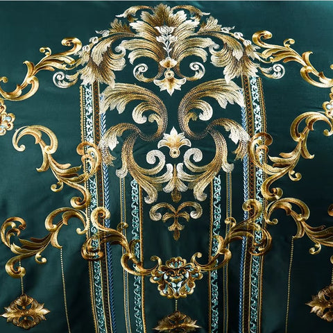 Close-up of baroque golden embroidery on emerald satin duvet
