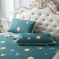 Close-up of botanical Thai latex cooling pillowcases on luxurious headboard
