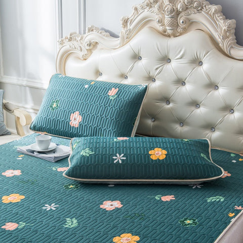 Close-up of botanical Thai latex cooling pillowcases on luxurious headboard