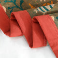 Close-up of Coral Reef Boho Cotton Throw Blanket red-orange edges stitching showing quality craftsmanship.
