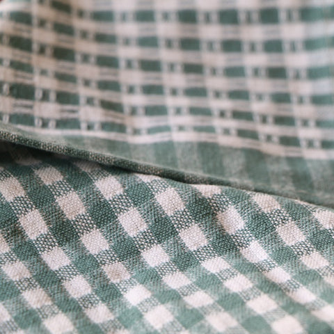 Close-up of green and white checkered fabric cotton kitchen towels set of 3