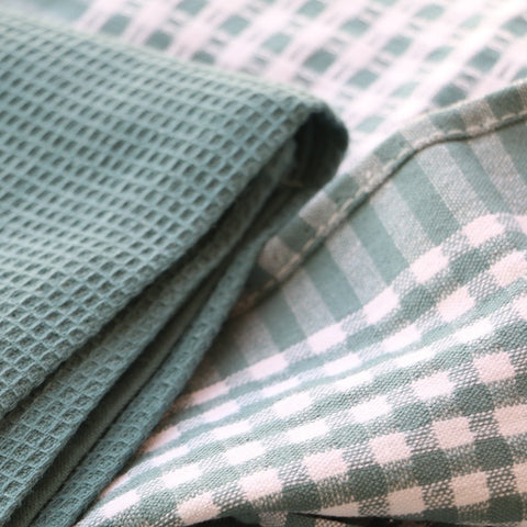 Close-up of green textured fabric with checkered pattern cotton kitchen towels set of 3