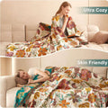 Floral-patterned blanket draped over a person on a couch with text 'Ultra Cozy' and 'Skin Friendly'.
